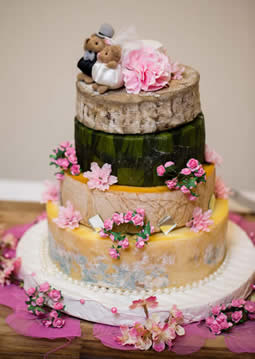Six whole cheeses decorated as a Wedding Cheese Cake. copyright www.gomesphotography.net