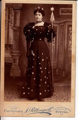 Lady in starred dress.   For New Years celebration?
