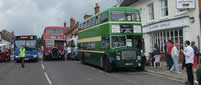 Matt watches four buses in Odiham High Street at the same time.  Not all red!